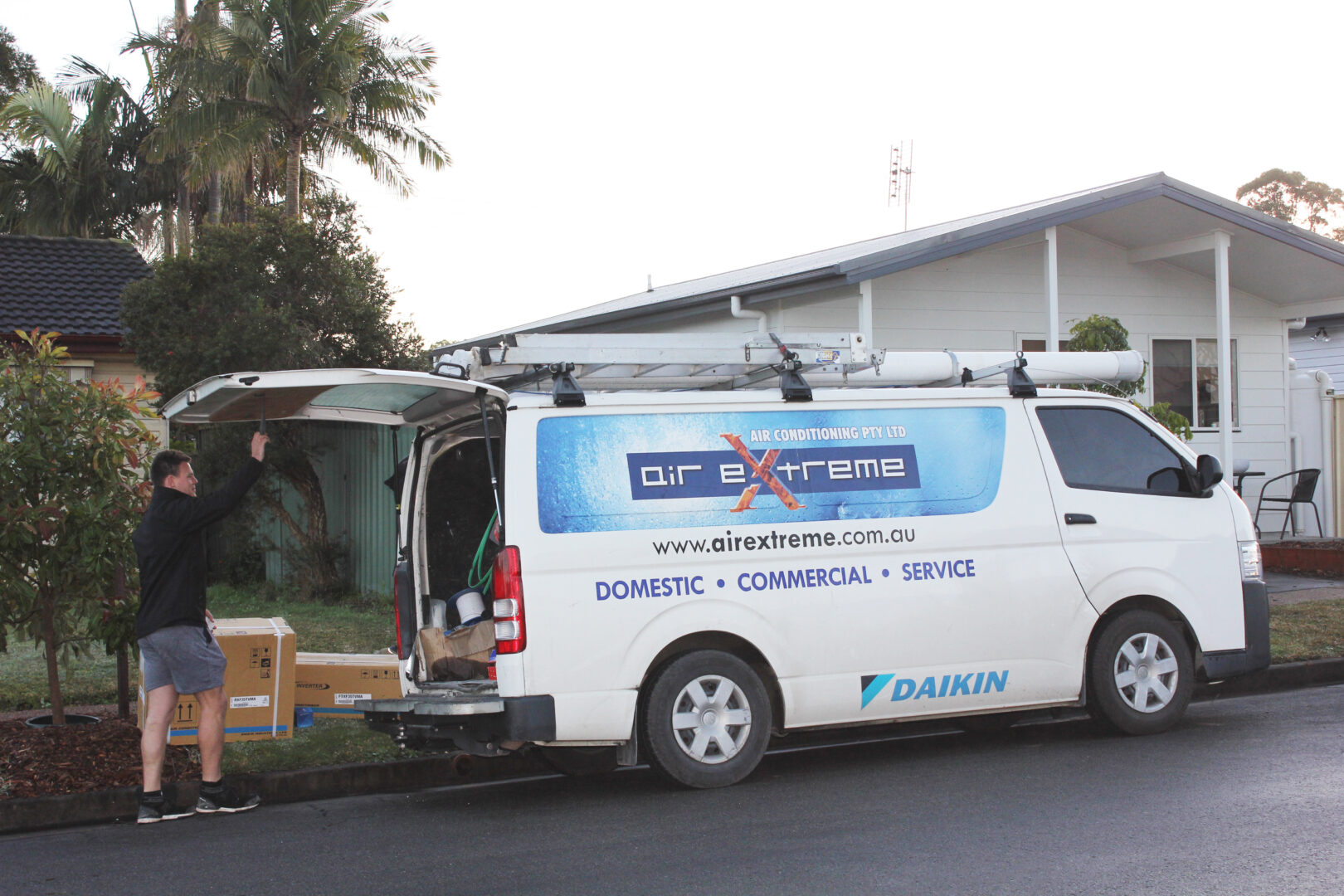 Air Extreme technician commissioning an air conditioning installation